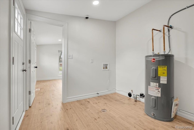 22809 Detour St, Macomb, MI 48082 - laundry room featuring water heater, hookup for a washing machine, light wood-style flooring, and recessed lighting