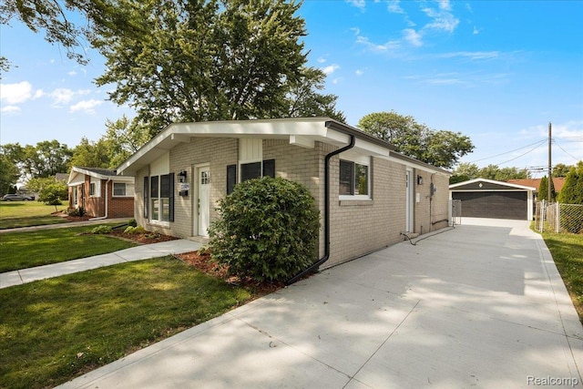 22809 Detour St, Macomb, MI 48082 - single story home with brick siding, an outbuilding, and a garage