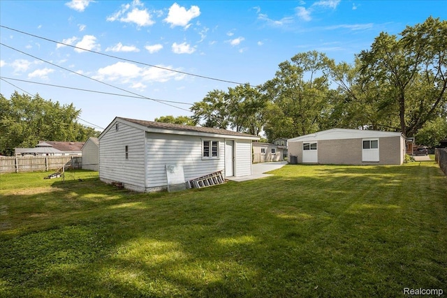 22809 Detour St, Macomb, MI 48082 - rear view of property with an outdoor structure