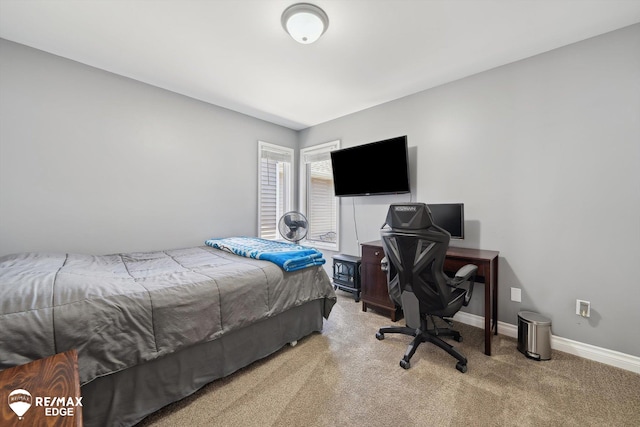 9164 Emily Dr, Davison, MI 48423 - carpeted bedroom featuring baseboards and a desk