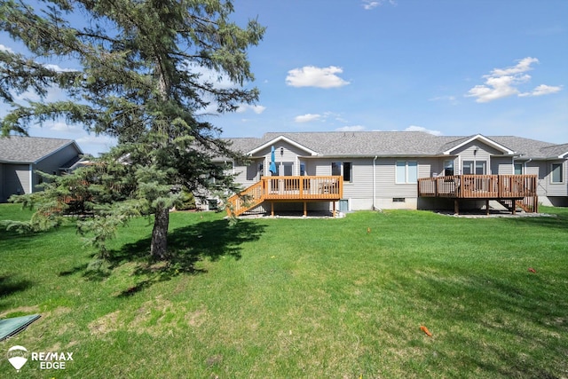 9164 Emily Dr, Davison, MI 48423 - rear view of house featuring a deck, a yard, and stairway