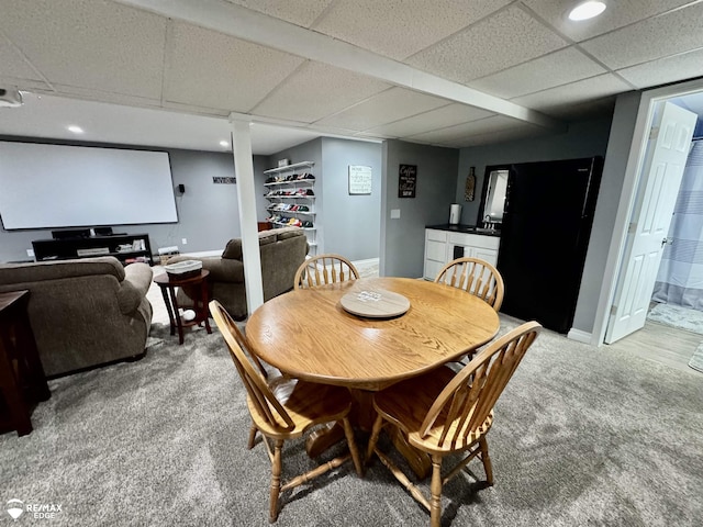 9164 Emily Dr, Davison, MI 48423 - dining space with light carpet, a drop ceiling, and recessed lighting