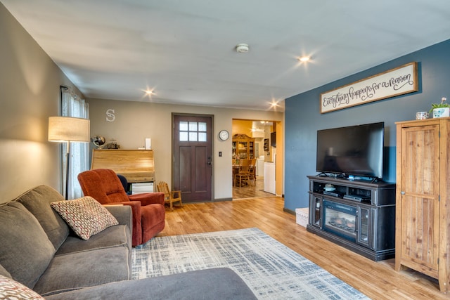 4180 15 Mile Rd, Barryton, MI 49305 - living room with wood finished floors and baseboards