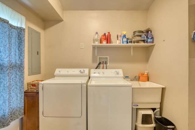 4180 15 Mile Rd, Barryton, MI 49305 - laundry area with electric panel and washer and dryer