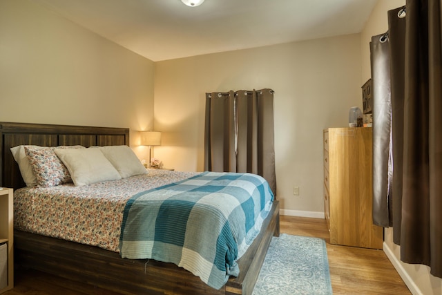 4180 15 Mile Rd, Barryton, MI 49305 - bedroom featuring wood finished floors and baseboards