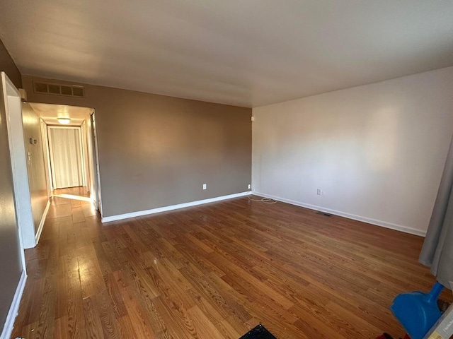 26235 Southwestern Hwy, Redford, MI 48239 - spare room with dark wood finished floors and baseboards