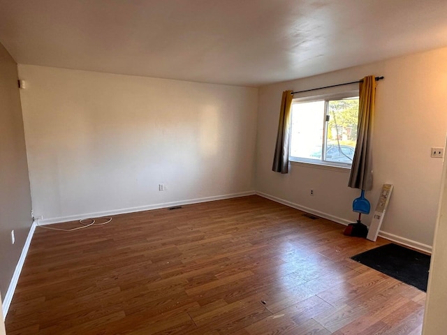 26235 Southwestern Hwy, Redford, MI 48239 - spare room featuring wood finished floors and baseboards