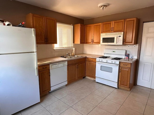 26235 Southwestern Hwy, Redford, MI 48239 - kitchen featuring white appliances, light countertops, decorative backsplash, and light tile patterned floors