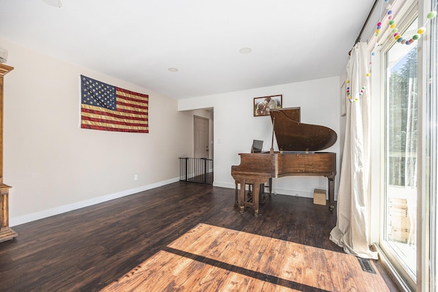 14555 Fruit Ridge Ave, Kent City, MI 49330 - sitting room with wood finished floors and baseboards