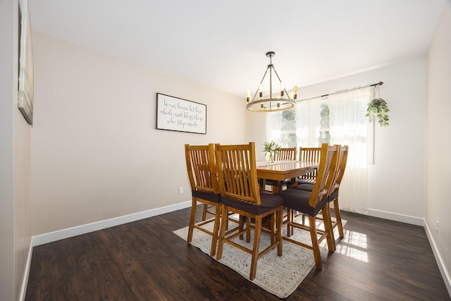 14555 Fruit Ridge Ave, Kent City, MI 49330 - dining room with a chandelier and dark wood-style flooring