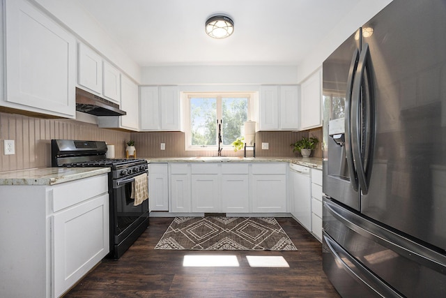 14555 Fruit Ridge Ave, Kent City, MI 49330 - kitchen with fridge with ice dispenser, black gas range oven, under cabinet range hood, dishwasher, and dark wood-style flooring