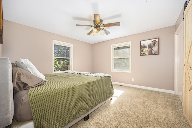 14555 Fruit Ridge Ave, Kent City, MI 49330 - bedroom featuring light carpet and ceiling fan