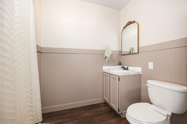 14555 Fruit Ridge Ave, Kent City, MI 49330 - bathroom featuring wood finished floors, a wainscoted wall, and vanity