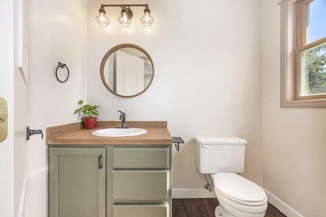 14555 Fruit Ridge Ave, Kent City, MI 49330 - half bathroom featuring wood finished floors and vanity