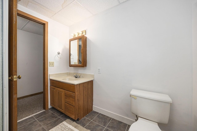 14555 Fruit Ridge Ave, Kent City, MI 49330 - bathroom featuring vanity, tile patterned flooring, and a drop ceiling