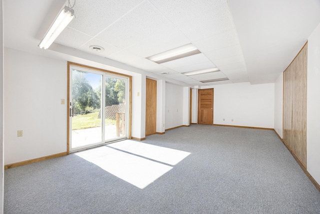 14555 Fruit Ridge Ave, Kent City, MI 49330 - unfurnished room with light carpet and baseboards
