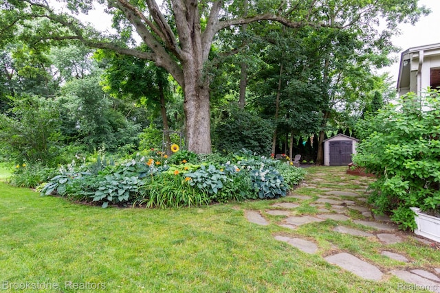 3845 Beechcrest, Rochester Hills, MI 48309 - view of green lawn featuring a storage unit