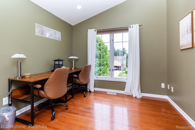 3845 Beechcrest, Rochester Hills, MI 48309 - office area featuring healthy amount of natural light, vaulted ceiling, and wood finished floors