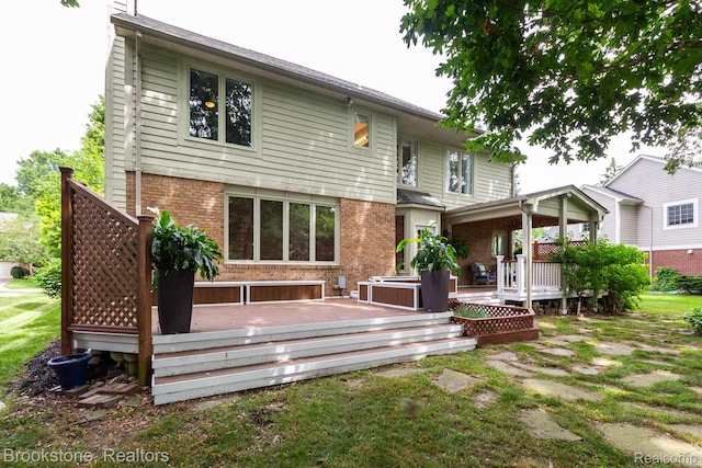 3845 Beechcrest, Rochester Hills, MI 48309 - back of property featuring brick siding and a deck
