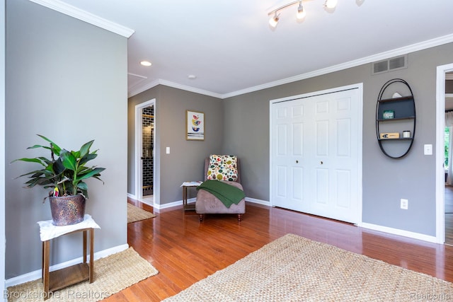 3845 Beechcrest, Rochester Hills, MI 48309 - living area with wood finished floors, recessed lighting, and ornamental molding