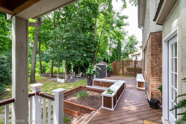 3845 Beechcrest, Rochester Hills, MI 48309 - wooden deck with a shed and a patio area