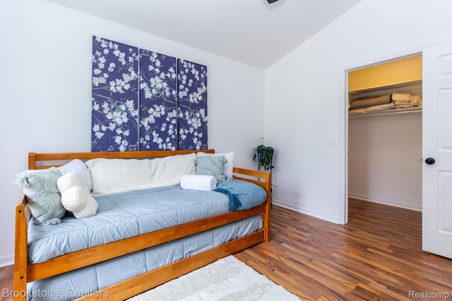 3845 Beechcrest, Rochester Hills, MI 48309 - bedroom with wood finished floors, a spacious closet, and lofted ceiling