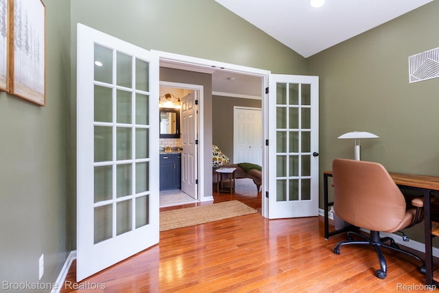 3845 Beechcrest, Rochester Hills, MI 48309 - office area with french doors, wood finished floors, and lofted ceiling