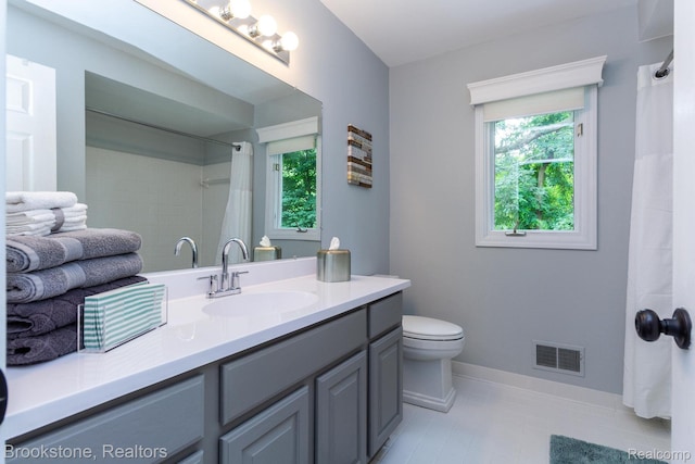 3845 Beechcrest, Rochester Hills, MI 48309 - bathroom with healthy amount of natural light, vanity, tile patterned flooring, and a shower with shower curtain