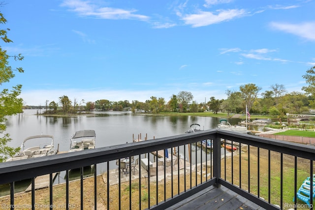 8873 Lagoon Dr, Brighton, MI 48116 - wooden terrace with a water view