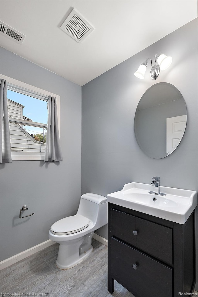 8873 Lagoon Dr, Brighton, MI 48116 - bathroom featuring baseboards and vanity