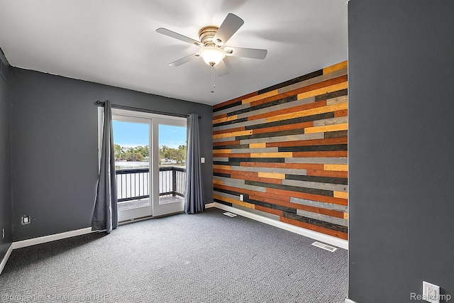 8873 Lagoon Dr, Brighton, MI 48116 - carpeted spare room featuring a ceiling fan and baseboards