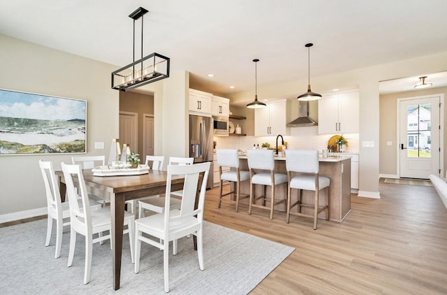 9088 N 34th St, Richland, MI 49083 - dining room with light wood finished floors and recessed lighting