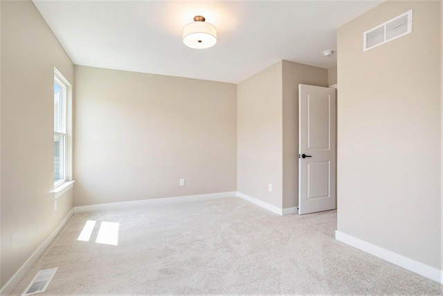 9088 N 34th St, Richland, MI 49083 - spare room featuring light colored carpet, plenty of natural light, and a smoke detector