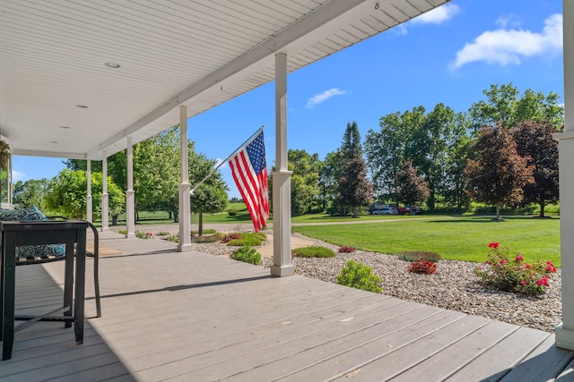 5160 Barker Rd, Jonesville, MI 49250 - deck featuring a lawn
