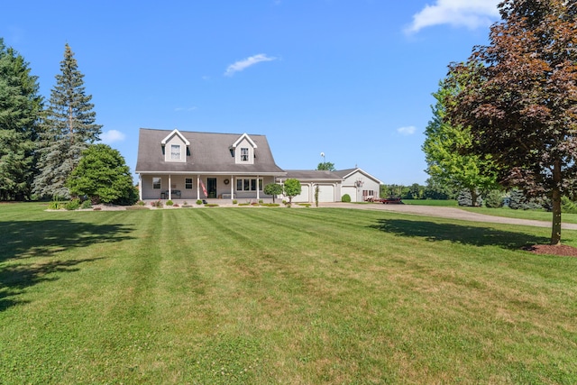5160 Barker Rd, Jonesville, MI 49250 - cape cod home with an attached garage, driveway, a front lawn, and covered porch