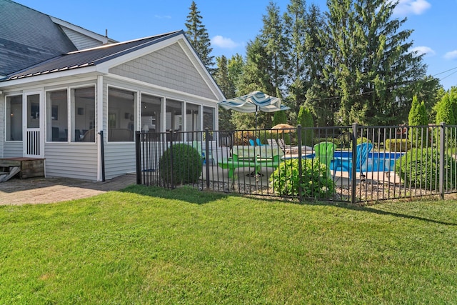 5160 Barker Rd, Jonesville, MI 49250 - view of yard with a sunroom and a patio area