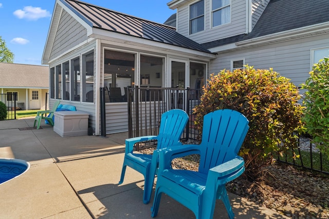 5160 Barker Rd, Jonesville, MI 49250 - view of patio / terrace with a sunroom