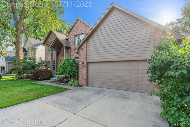 4317 Vassar Dr, Troy, MI 48085 - view of front of home featuring brick siding, a front yard, and concrete driveway