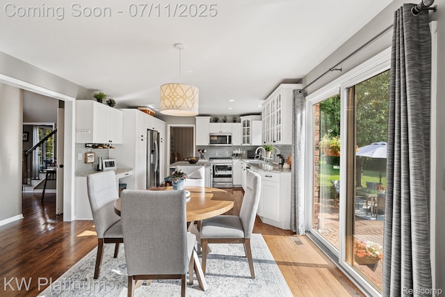 4317 Vassar Dr, Troy, MI 48085 - dining space featuring light wood-style flooring and recessed lighting