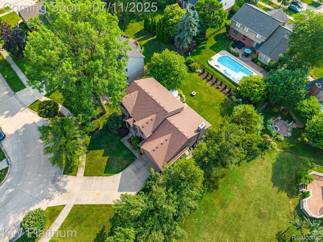 4317 Vassar Dr, Troy, MI 48085 - aerial overview of property's location with a pool and nearby suburban area