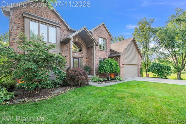 4317 Vassar Dr, Troy, MI 48085 - traditional-style home with brick siding, driveway, a front yard, and an attached garage
