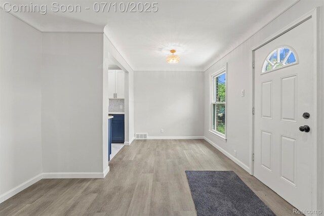 19777 Santa Rosa Dr, Detroit, MI 48221 - foyer entrance with light wood-style flooring and baseboards