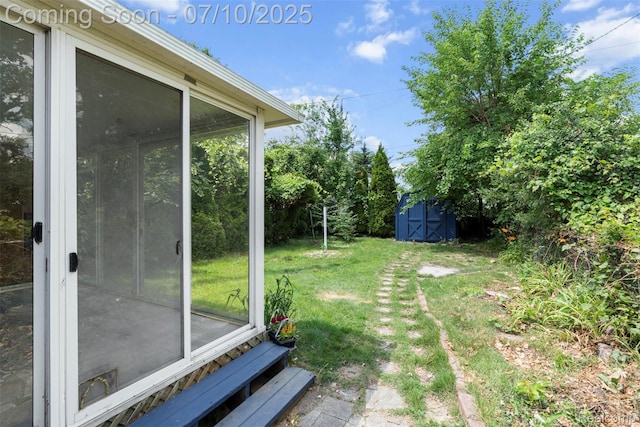 19777 Santa Rosa Dr, Detroit, MI 48221 - view of green lawn featuring a storage unit