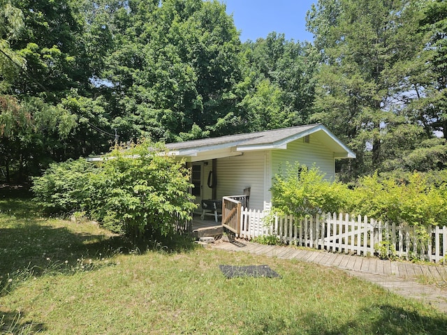 1936 W Cleveland, New Era, MI 49446 - view of front of house with a wooden deck