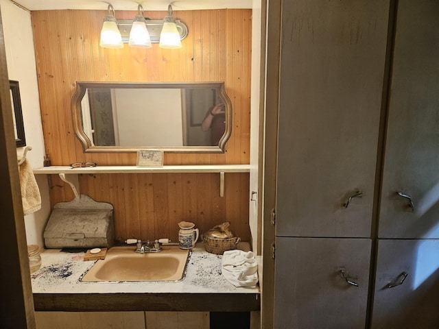 1936 W Cleveland, New Era, MI 49446 - bathroom with wooden walls and a sink