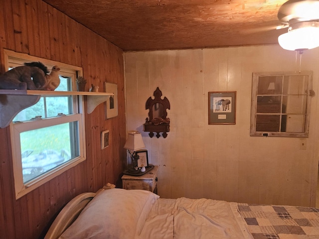 1936 W Cleveland, New Era, MI 49446 - bedroom featuring wood walls