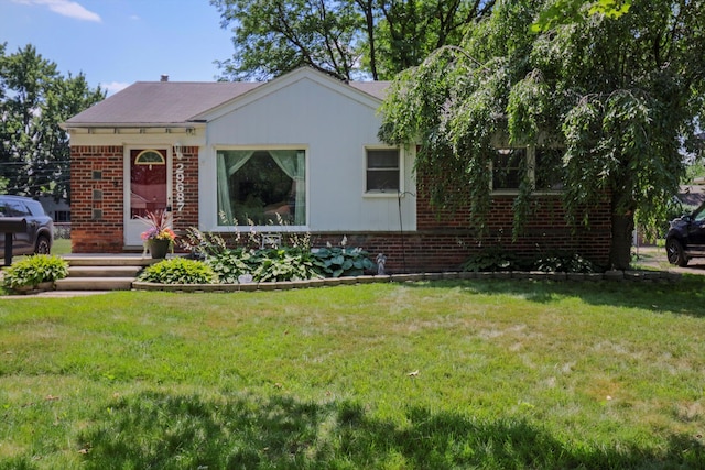 29687 Westfield St, Livonia, MI 48150 - view of front facade with brick siding and a front lawn