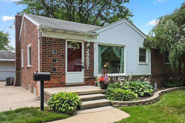 29687 Westfield St, Livonia, MI 48150 - single story home with brick siding, a chimney, a shingled roof, and a garage