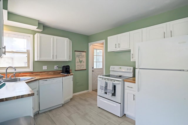 29687 Westfield St, Livonia, MI 48150 - kitchen with white appliances, butcher block countertops, and white cabinetry