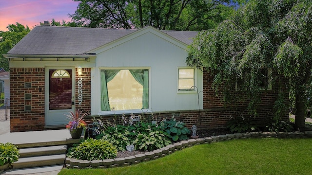 29687 Westfield St, Livonia, MI 48150 - view of front of property featuring a front lawn, brick siding, and a shingled roof